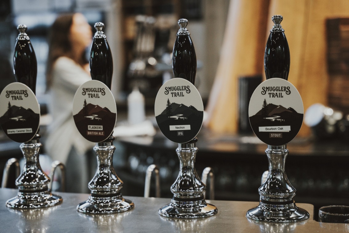 Branded tap handles at Smugglers Trail in Langley