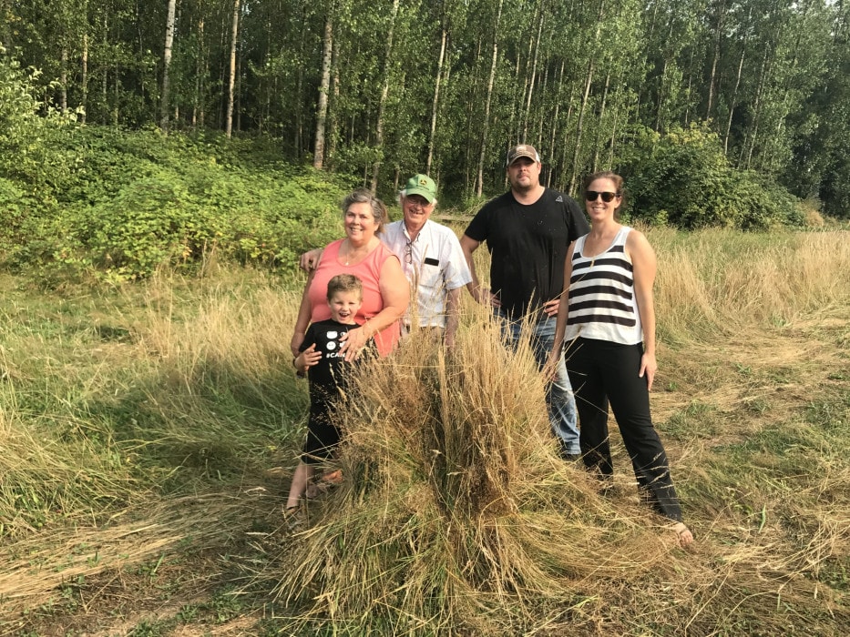 Melanie with her Mom Wendy, Dad Rod, brother Kevin and son Lachlan stooking barley on the Locality farm in Langley