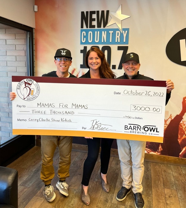 Gary Brucker from Barn Owl Brewing doing a cheque presentation